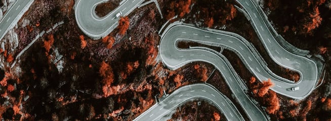 a winding road looked from above